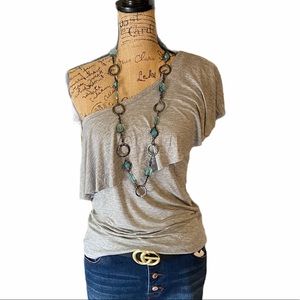 Tart gray ruffled off one shoulder blouse